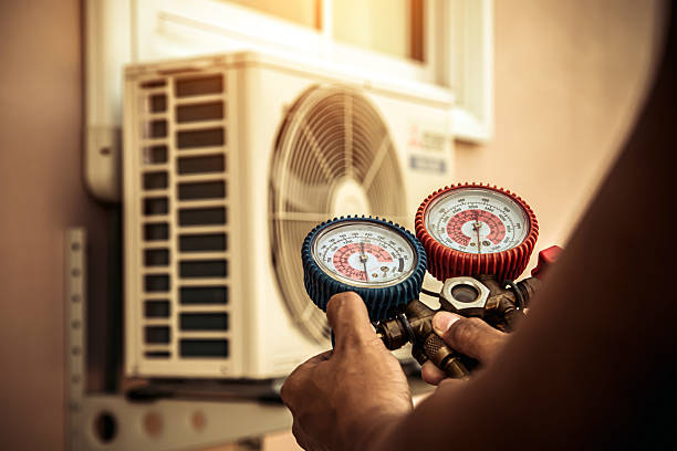 Professional Hvac Maintenance technician working in Falkville, AL
